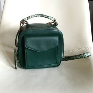 Free People green convertible leather bag with snake skin detail